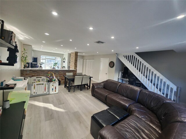 10875 NW 8th St, Pembroke Pines, FL 33026 - living area featuring recessed lighting, light wood-type flooring, and stairs