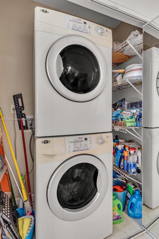 2775 NE 187th St Unit Ph6, Aventura, FL 33180 - washroom featuring stacked washing machine and dryer
