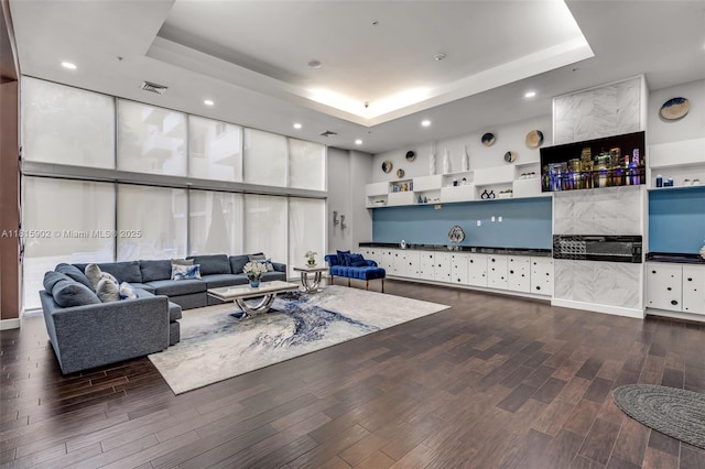 2775 NE 187th St Unit Ph6, Aventura, FL 33180 - living room featuring a raised ceiling, dark wood-type flooring, recessed lighting, and expansive windows
