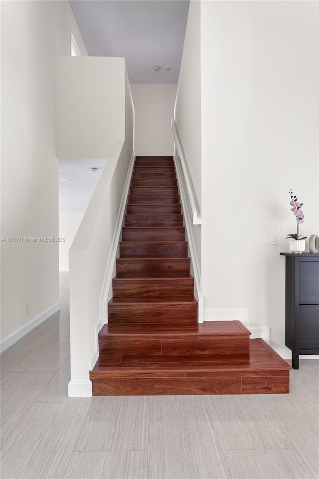 210 Somerset Way, Weston, FL 33326 - staircase with wood finished floors