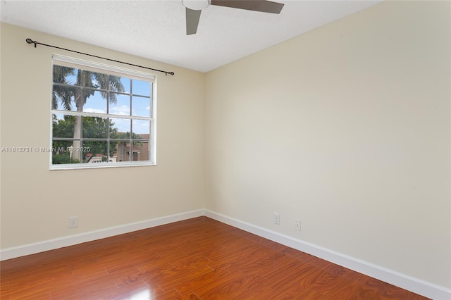 210 Somerset Way, Weston, FL 33326 - empty room with wood finished floors, baseboards, and ceiling fan
