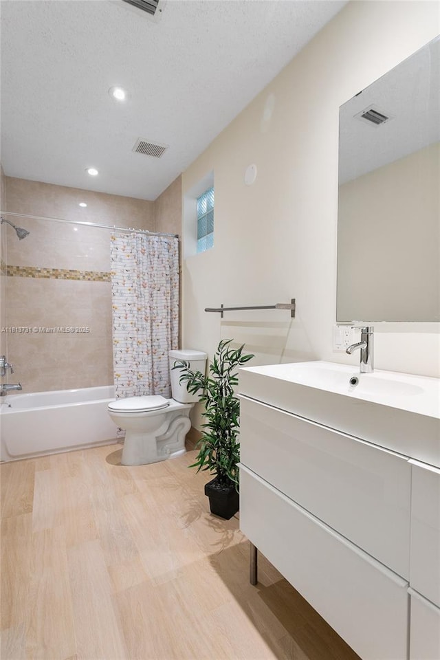 210 Somerset Way, Weston, FL 33326 - full bath with toilet, vanity, shower / tub combo with curtain, recessed lighting, and wood finished floors