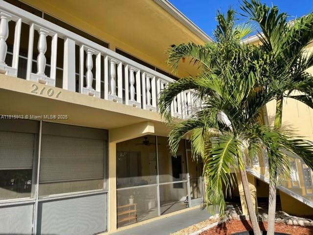 2101 NE 68th St Unit 202, Fort Lauderdale, FL 33308 - view of side of home featuring a balcony