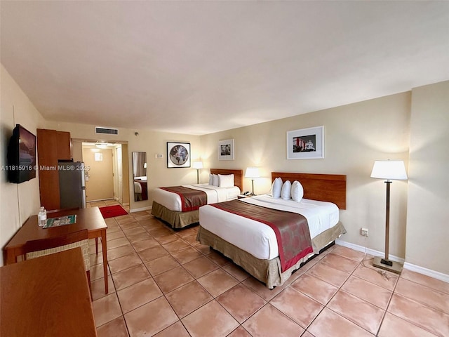 19201 Collins Ave Unit 1019, Sunny Isles Beach, FL 33160 - bedroom with light tile patterned floors and baseboards