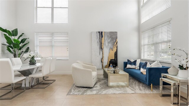 1981 NW 171st Ave, Pembroke Pines, FL 33028 - living area with a towering ceiling, tile patterned floors, and healthy amount of natural light