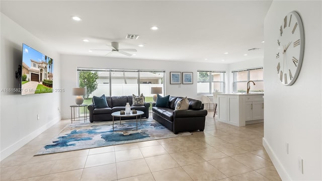 1981 NW 171st Ave, Pembroke Pines, FL 33028 - living area featuring healthy amount of natural light, recessed lighting, a ceiling fan, light tile patterned floors, and baseboards