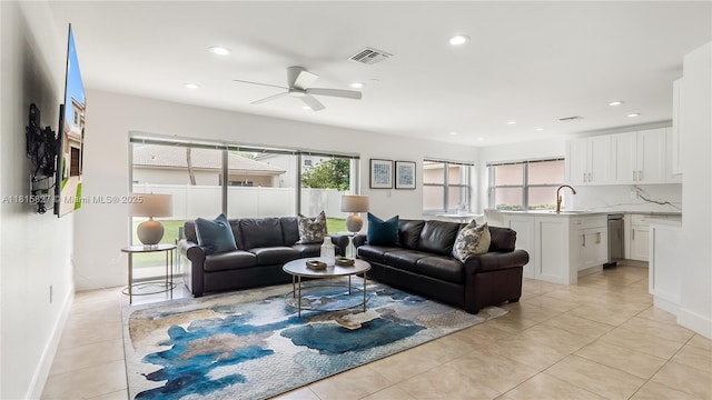 1981 NW 171st Ave, Pembroke Pines, FL 33028 - living area with ceiling fan, light tile patterned floors, recessed lighting, and baseboards