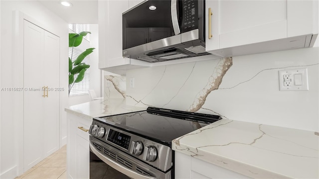 1981 NW 171st Ave, Pembroke Pines, FL 33028 - kitchen featuring stainless steel appliances, white cabinetry, light stone countertops, and recessed lighting