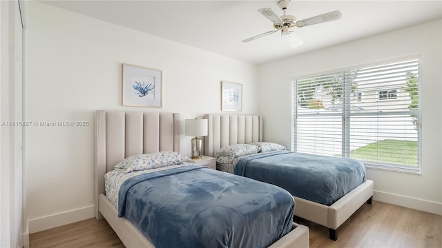 1981 NW 171st Ave, Pembroke Pines, FL 33028 - bedroom featuring baseboards, light wood-style flooring, and ceiling fan