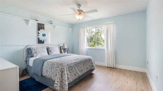 1981 NW 171st Ave, Pembroke Pines, FL 33028 - bedroom featuring wood finished floors, baseboards, and ceiling fan