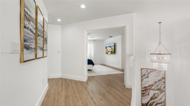 1981 NW 171st Ave, Pembroke Pines, FL 33028 - hallway featuring a chandelier, light wood-style floors, baseboards, and recessed lighting