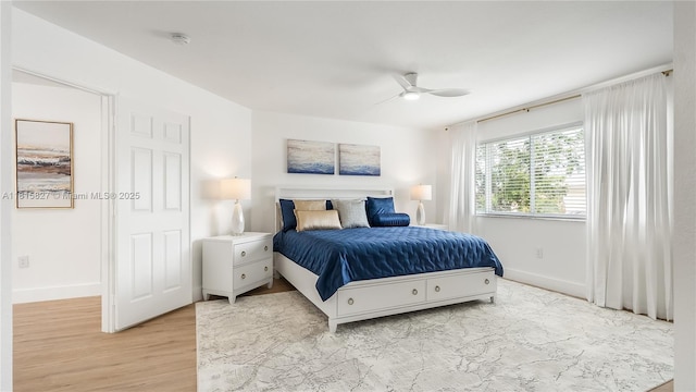1981 NW 171st Ave, Pembroke Pines, FL 33028 - bedroom with baseboards, light wood finished floors, and a ceiling fan