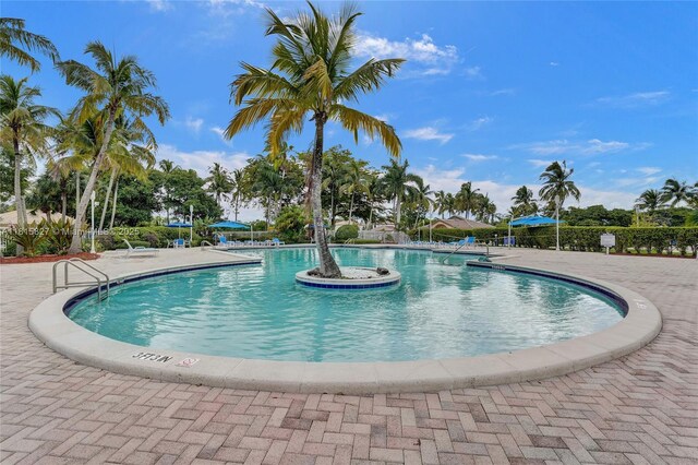1981 NW 171st Ave, Pembroke Pines, FL 33028 - community pool featuring a patio