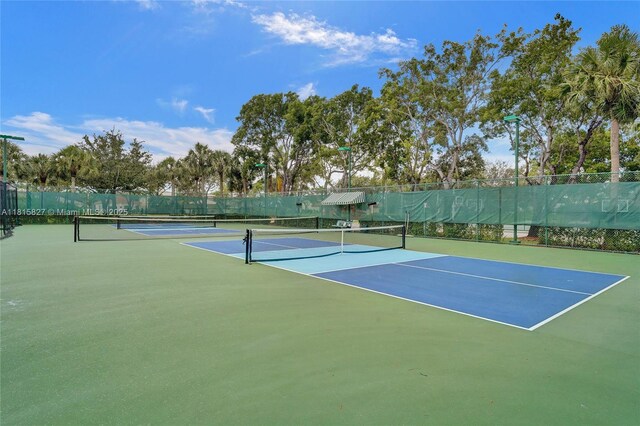 1981 NW 171st Ave, Pembroke Pines, FL 33028 - view of tennis court featuring community basketball court