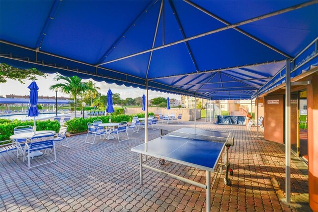 9601 Sunrise Lakes Blvd Unit 106, Sunrise, FL 33322 - view of swimming pool featuring outdoor dining area