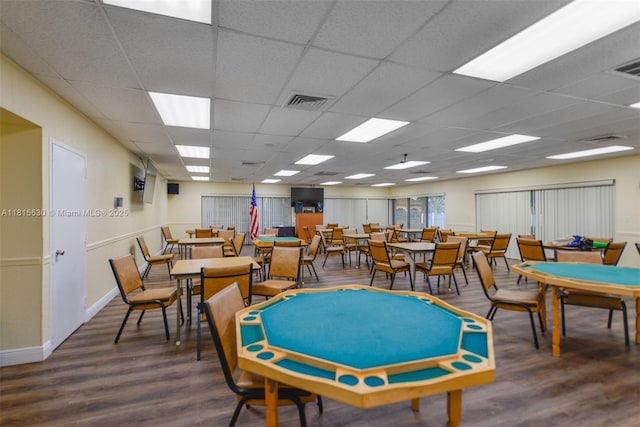 9601 Sunrise Lakes Blvd Unit 106, Sunrise, FL 33322 - recreation room with wood finished floors, baseboards, and a paneled ceiling