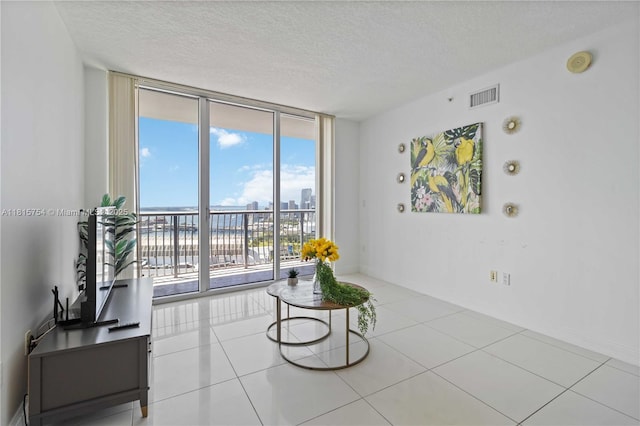 1750 N Bayshore Dr Unit 4604, Miami, FL 33132 - tiled living area with floor to ceiling windows and a textured ceiling