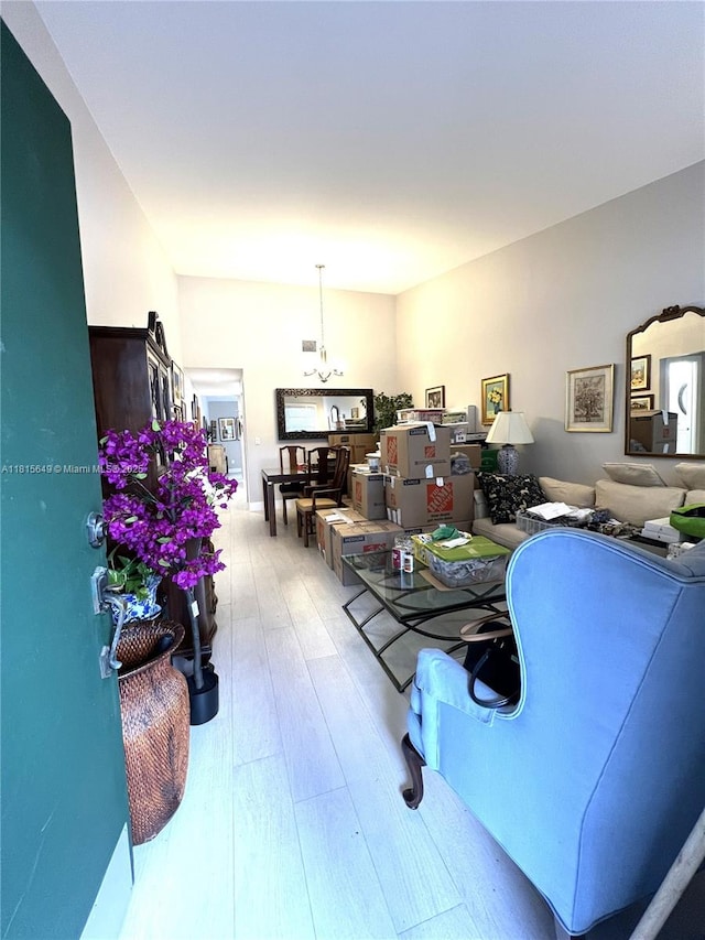10830 SW 72nd St Unit 14, Miami, FL 33173 - living area featuring wood finished floors and a chandelier