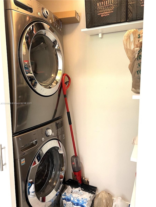 10830 SW 72nd St Unit 14, Miami, FL 33173 - washroom featuring stacked washer / dryer
