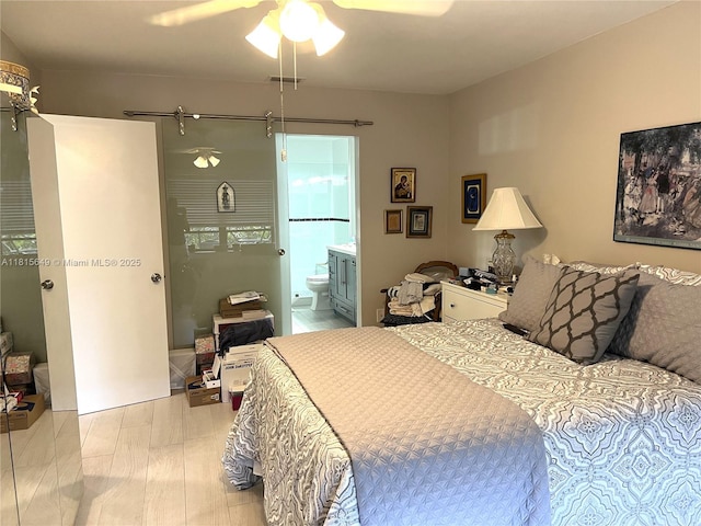 10830 SW 72nd St Unit 14, Miami, FL 33173 - bedroom featuring a ceiling fan and connected bathroom