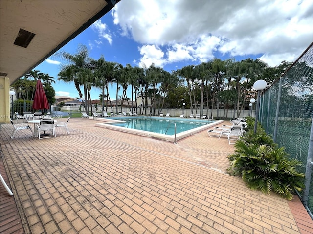 10830 SW 72nd St Unit 14, Miami, FL 33173 - community pool with a patio area