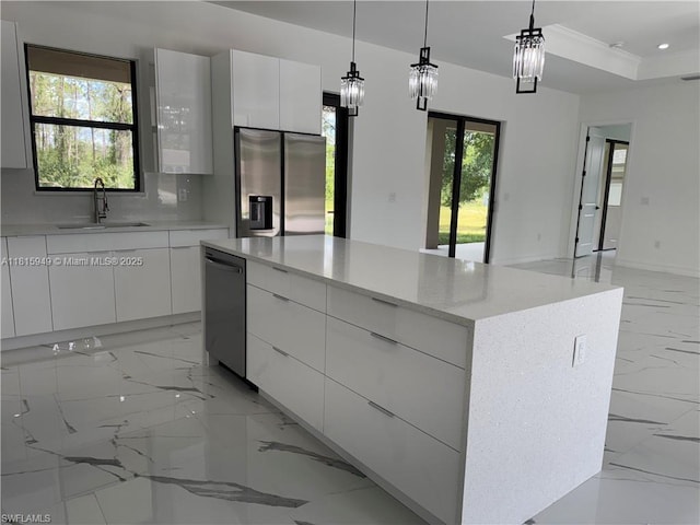 1016 Magnolia Ave, Lehigh Acres, FL 33974 - kitchen with stainless steel appliances, modern cabinets, a sink, light marble finish floors, and recessed lighting