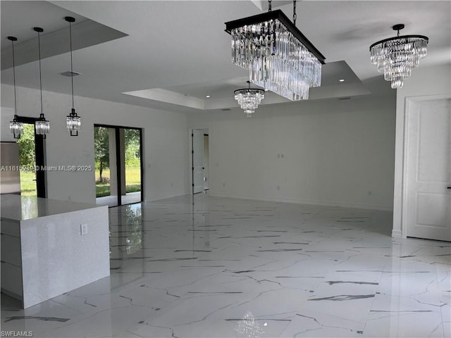 1016 Magnolia Ave, Lehigh Acres, FL 33974 - spare room featuring a chandelier, a tray ceiling, baseboards, marble finish floors, and recessed lighting