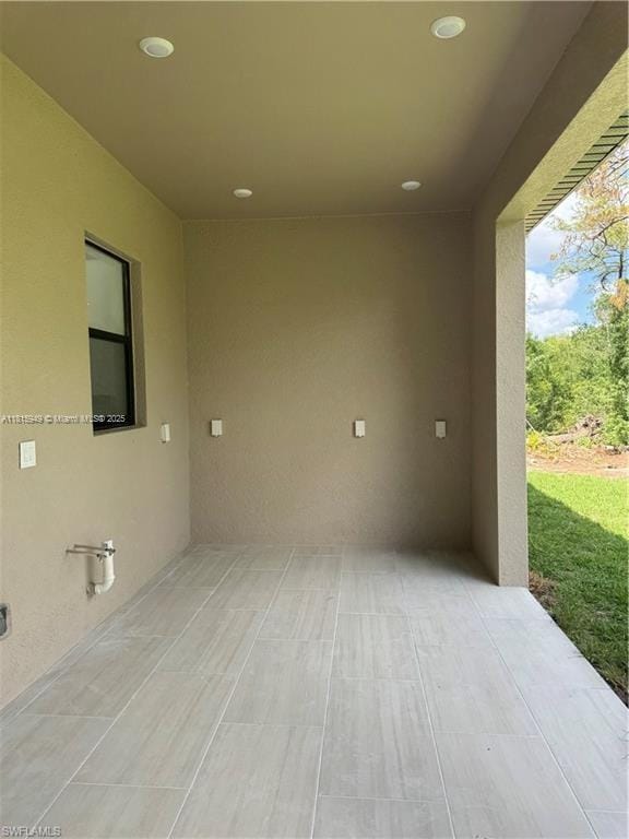 1016 Magnolia Ave, Lehigh Acres, FL 33974 - view of patio / terrace