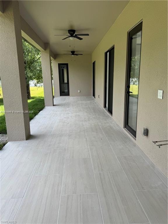 1016 Magnolia Ave, Lehigh Acres, FL 33974 - view of patio with ceiling fan