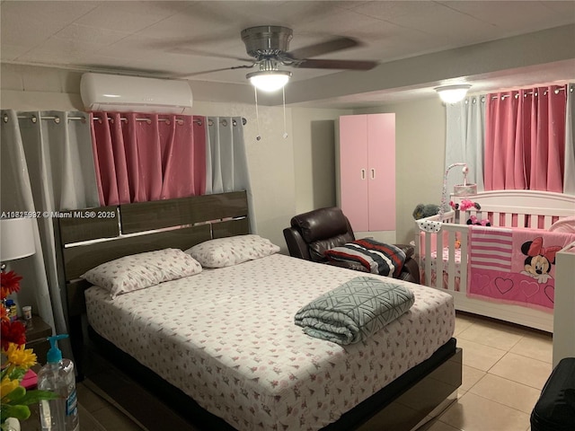 6309 Wiley St, Hollywood, FL 33023 - bedroom featuring a wall unit AC, tile patterned floors, and a ceiling fan