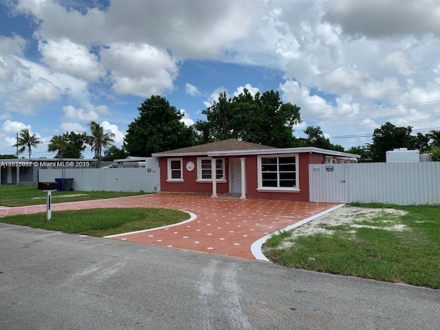 6309 Wiley St, Hollywood, FL 33023 - single story home featuring a gate and stucco siding