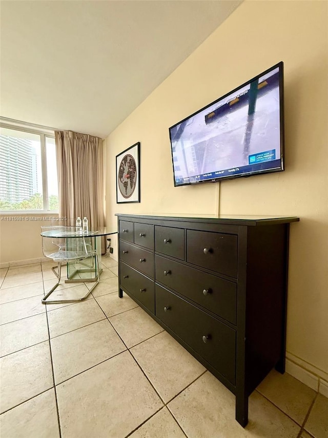 19201 Collins Ave Unit 242, Sunny Isles Beach, FL 33160 - bedroom featuring light tile patterned floors and baseboards