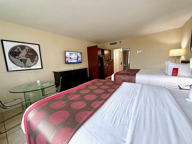 19201 Collins Ave Unit 242, Sunny Isles Beach, FL 33160 - bedroom with freestanding refrigerator