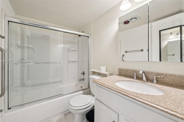 4007 Durham A 4007, Deerfield Beach, FL 33442 - bathroom featuring toilet, vanity, and bath / shower combo with glass door