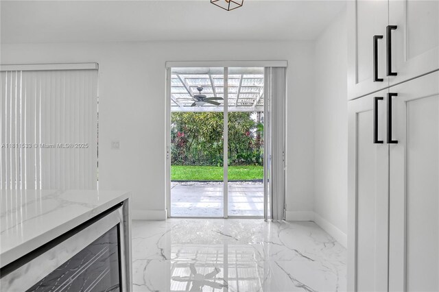 12173 Colony Preserve Dr, Boynton Beach, FL 33436 - doorway with light marble finish flooring and ceiling fan