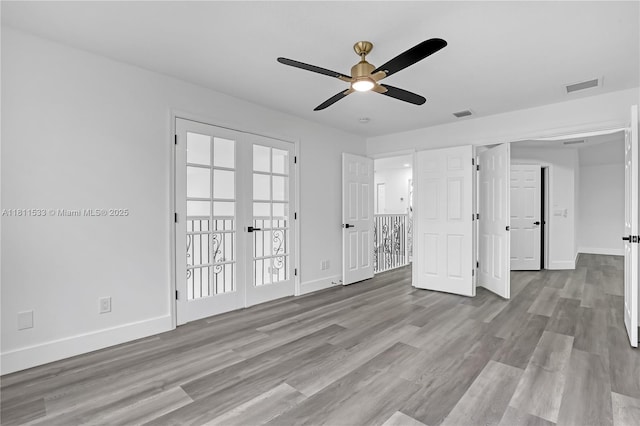 12173 Colony Preserve Dr, Boynton Beach, FL 33436 - unfurnished bedroom featuring wood finished floors and ceiling fan