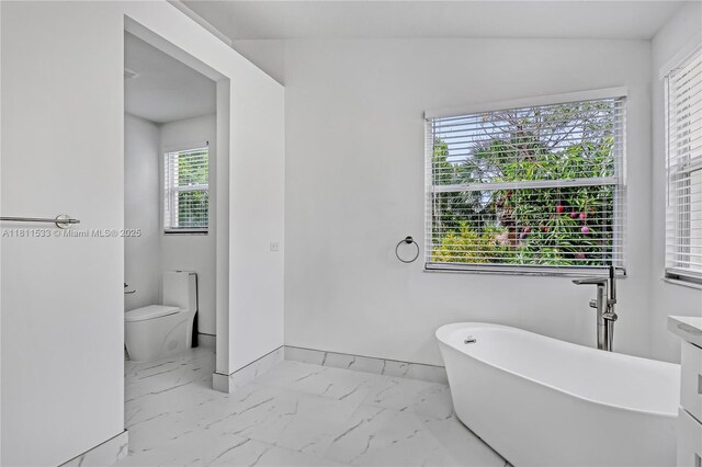 12173 Colony Preserve Dr, Boynton Beach, FL 33436 - full bathroom with marble finish floors and a freestanding tub
