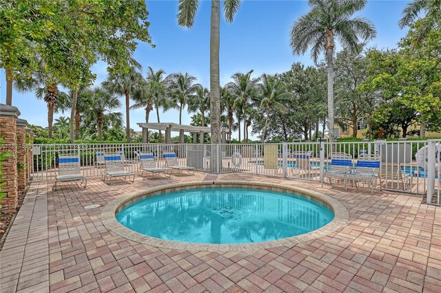 12173 Colony Preserve Dr, Boynton Beach, FL 33436 - community pool featuring a patio