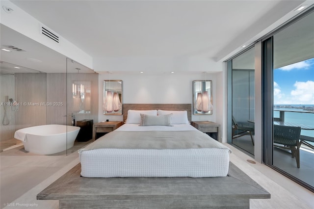 650 NE 32nd St Unit 4701, Miami, FL 33137 - bedroom with multiple windows and a closet