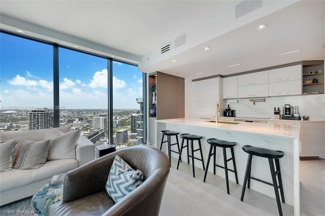 650 NE 32nd St Unit 4701, Miami, FL 33137 - living room with a city view and a wall of windows