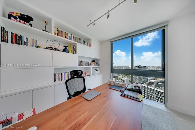 650 NE 32nd St Unit 4701, Miami, FL 33137 - office space with built in features, a wall of windows, and track lighting