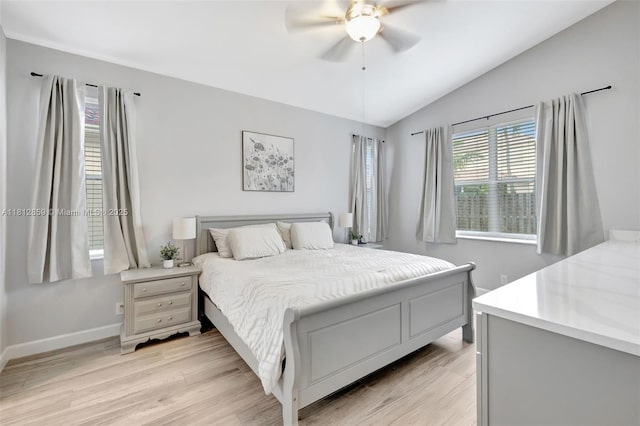 3059 Dogwood Ln, Margate, FL 33063 - bedroom with light wood-style flooring, lofted ceiling, baseboards, and ceiling fan