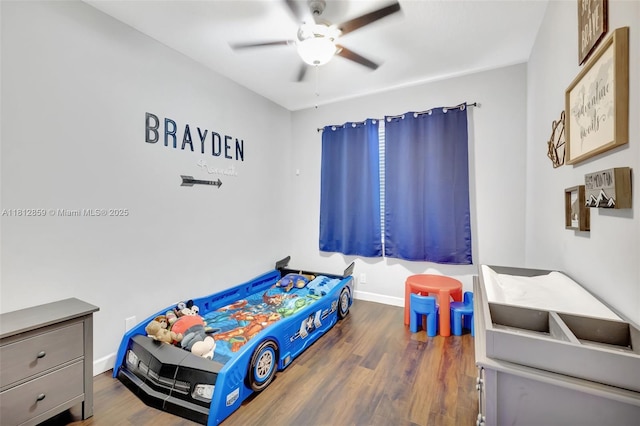 3059 Dogwood Ln, Margate, FL 33063 - bedroom featuring wood finished floors, a ceiling fan, and baseboards