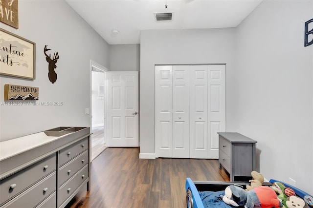 3059 Dogwood Ln, Margate, FL 33063 - bedroom with dark wood-type flooring and a closet