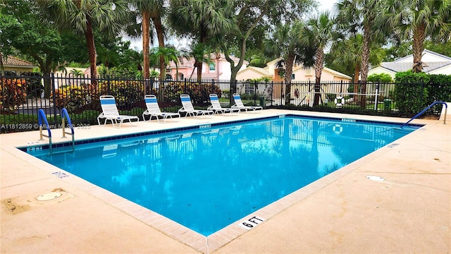 3059 Dogwood Ln, Margate, FL 33063 - community pool featuring a patio area