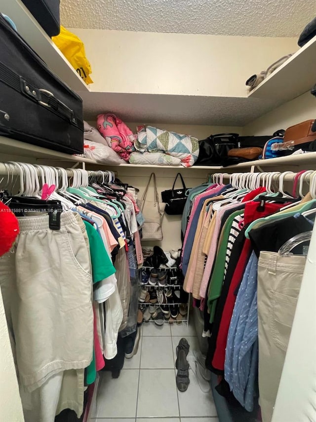 7740 Camino Real Unit G-305, Miami, FL 33143 - walk in closet with tile patterned flooring