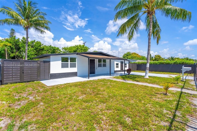 19330 NE 2nd Ave, Miami, FL 33179 - view of front of house featuring a patio and stucco siding
