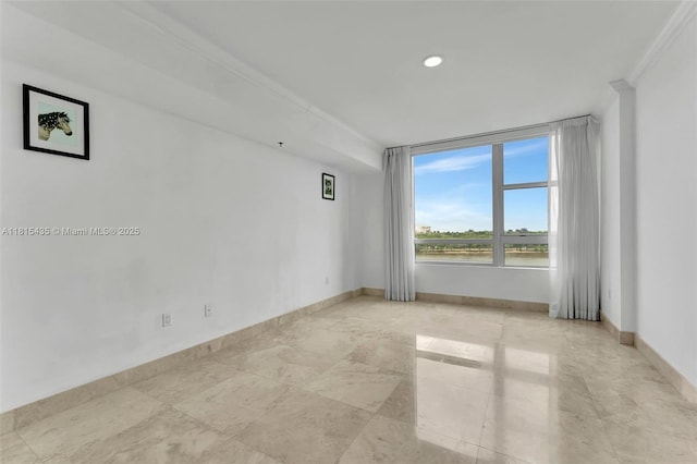 2641 N Flamingo Rd Unit 603N, Sunrise, FL 33323 - spare room featuring baseboards, recessed lighting, and crown molding