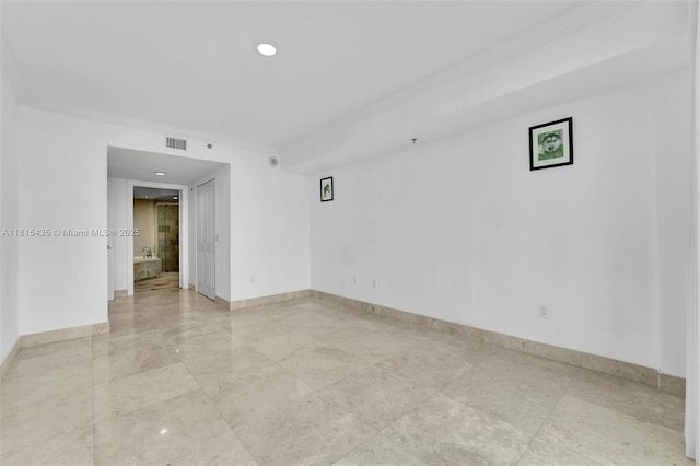2641 N Flamingo Rd Unit 603N, Sunrise, FL 33323 - empty room featuring baseboards and crown molding