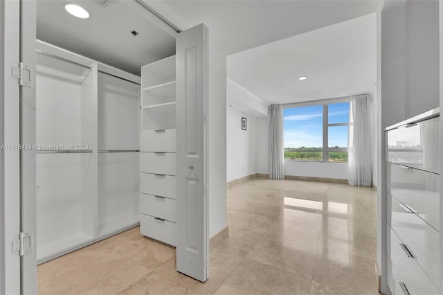 2641 N Flamingo Rd Unit 603N, Sunrise, FL 33323 - walk in closet with light tile patterned floors